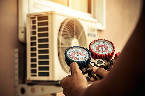 Professional Hvac Maintenance technician working in Ortonville, MI